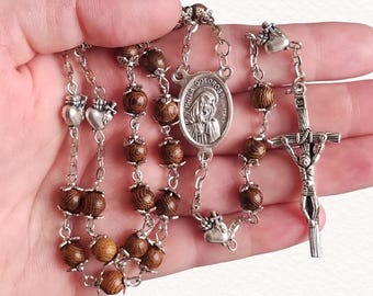 Rosenkrans i wengeträ • Mittdekoration i Mater Dolorosa, Ecce Homo • Pärlor i patershjärtat