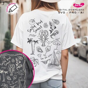 May include: A white t-shirt with a black and white illustration of a beach scene. The illustration includes a sailboat, palm trees, a lobster, a glass of wine, and the text "Salty but Sweet".