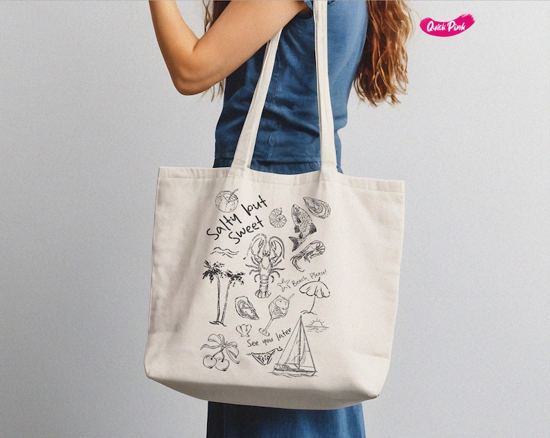 May include: A white canvas tote bag with black illustrations of a lobster, fish, palm trees, and other beach-themed items. The text "Salty but Sweet" is printed on the bag.