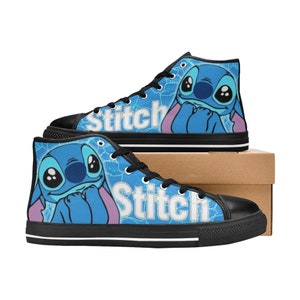 May include: Blue and black high-top sneakers with a cartoon Stitch character and the word "Stitch" on the side.