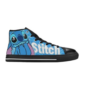 May include: Blue and black high-top canvas shoes with a cartoon Stitch character and the word "Stitch" printed on the side.