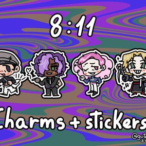 May include: Four cartoon characters with different hairstyles and outfits. The characters are wearing charms and stickers. The text "8:11 Charms + Stickers!" is at the top of the image.