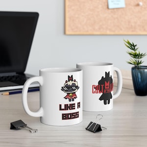 May include: Two white ceramic mugs with black and red designs. One mug features a cartoon sheep wearing sunglasses and a red cape with the text "Like a Boss". The other mug features a black silhouette of a creature with the text "Cult of the Lamb".