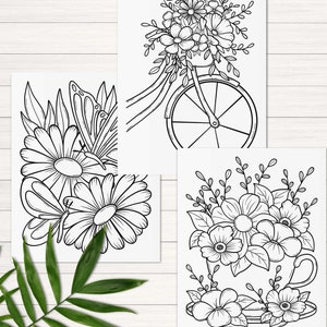 Peut inclure: Trois pages &agrave; colorier en noir et blanc repr&eacute;sentant des motifs floraux. La premi&egrave;re page montre un papillon et des fleurs. La deuxi&egrave;me page montre un v&eacute;lo avec des fleurs dans le panier. La troisi&egrave;me page montre une tasse avec des fleurs.