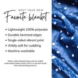 May include: A soft blue blanket with white polka dots. The blanket is made of 100% polyester and has durable hemmed edges. It is machine washable and single-sided with a vibrant print.  "Meet your new favorite blanket."