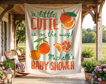 Baner na baby shower „A Little Cutie”, dekoracja na baby shower w kolorze cytrusowo-pomarańczowym, spersonalizowany napis powitalny