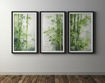 May include: Three framed watercolor paintings of bamboo stalks and leaves in shades of green. The artwork is set against a white background, with black frames. The bamboo art is displayed on a wall above a wooden floor.