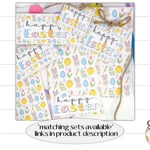 May include: A set of five colorful Happy Easter gift tags with a bunny, chick, and egg pattern. The tags are tied with twine and have a white background with pastel colors. The text "Happy Easter" is written in a handwritten font.