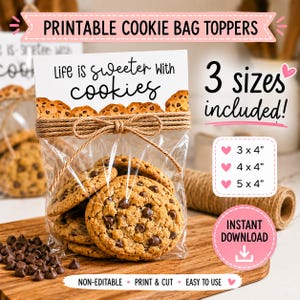 May include: A clear cellophane bag filled with chocolate chip cookies, tied with twine, and a printable cookie bag topper. The topper reads "Life is sweeter with cookies" and includes three size options: 7.6x10.2cm, 10.2x10.2cm, and 12.7x10.2cm.