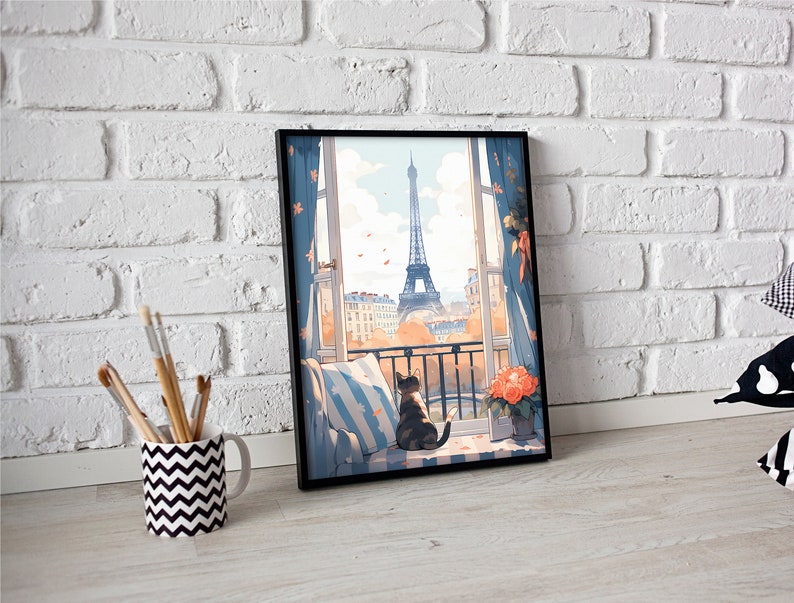 May include: A framed print of a cat sitting on a windowsill looking out at the Eiffel Tower in Paris. The window is open and there are flowers on the sill. The cat is black and white and the print is in a black frame.