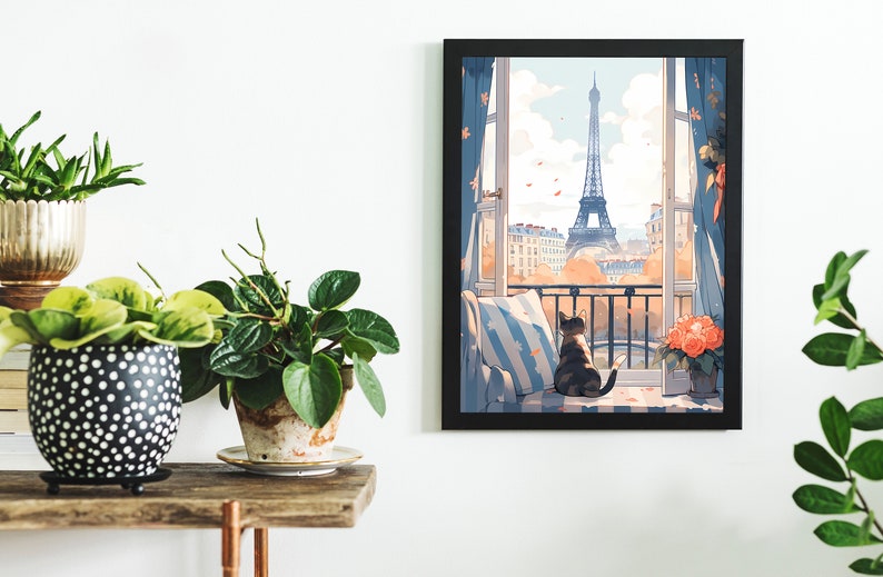 May include: A framed illustration of a cat sitting on a window seat looking out at the Eiffel Tower in Paris. The window is open and there are leaves blowing in the wind. The cat is brown and black and the illustration is in a cartoon style.