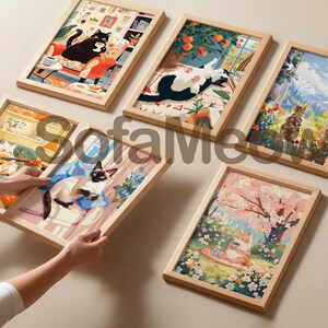 May include: A collection of six framed art prints featuring whimsical illustrations of cats in various settings. The artwork includes cats lounging indoors, outdoors, and in scenic landscapes, all with a soft, colorful aesthetic.
