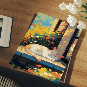 May include: A white and orange cat sleeps on a wooden porch with a colourful flower garden behind it. The cat is lying on its side with its head resting on its paws. The flowers are in bloom and are a variety of colours, including red, yellow, and white.