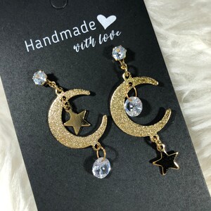 Glimmering Crescent & Star Asymmetrical Zircon Earrings – A Celestial Charm for Elegant Evenings