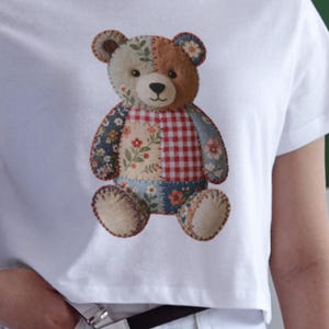 Eight patchwork quilted PNGs featuring various farm animals, including a duck, rabbit, bear, goat, cow, dog, sheep, and cat. Each animal is crafted with a mix of floral and red gingham fabrics, creating a charming, rustic aesthetic.