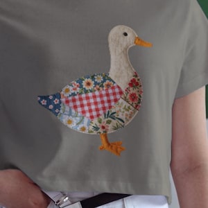 Eight patchwork quilted PNGs featuring various farm animals, including a duck, rabbit, bear, goat, cow, dog, sheep, and cat. Each animal is crafted with a mix of floral and red gingham fabrics, creating a charming, rustic aesthetic.