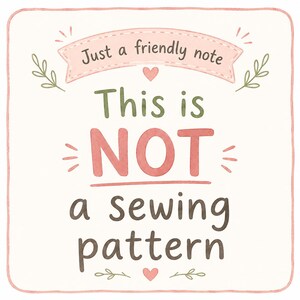May include: A square sign with rounded corners featuring a light pink banner at the top with the text Just a friendly note. Below this, the text reads This is NOT a sewing pattern in large, dark green, red, and brown lettering with small hearts.