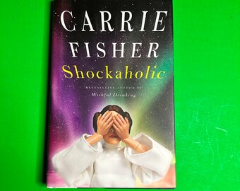 Primera edición del libro de tapa dura de Carrie Fisher “Shockaholic”