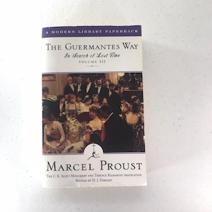 The Guermantes Way: In Search Of Lost Time Volume III” by Marcel Proust. Softcover in good condition. Any wear is pictured.