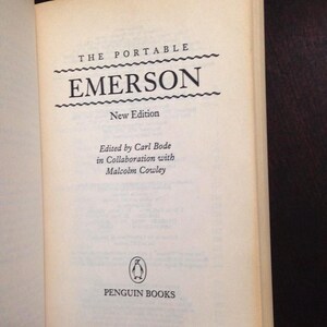 May include: The Portable Emerson, a book with a black and white cover featuring the title "THE PORTABLE EMERSON" in a wavy border and the text "New Edition" below. The book is published by Penguin Books.