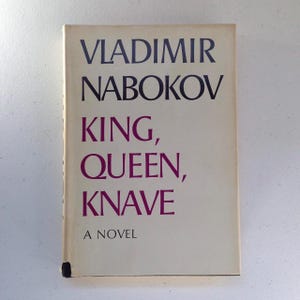 Vladimir Nabokov “King, Queen, Knave”. Hardcover with dust jacket in good vintage condition. Any wear is pictured.