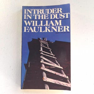 William Faulkner “Intruder in the Dust” paperback in good vintage condition. Any wear is pictured.