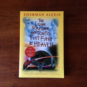 Sherman Alexie “The Lone Ranger And Tonto Fistfight In Heaven”. Paperback in good used condition. Any wear is pictured.