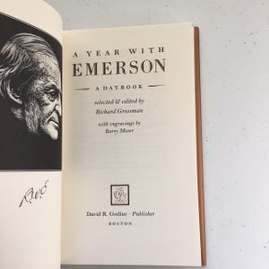 May include: A book titled "A Year With Emerson: A Daybook" by Richard Grossman with engravings by Barry Moser. The book is published by David R. Godine, Boston.