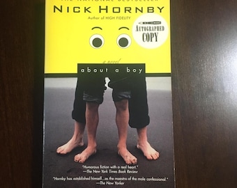 SIGNED Nick Hornby “About A Boy”. Paperback in good condition.