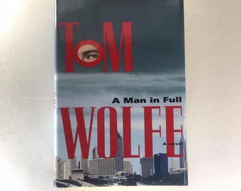 Tom Wolfe “A Man In Full”. First edition hardcover with dust jacket in very good condition.