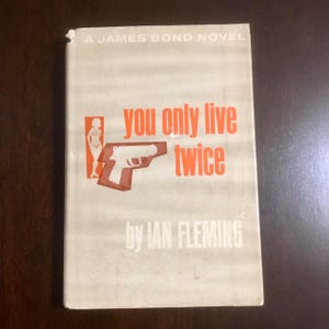 Ian Fleming “You Only Live Twice”, a James Bond novel. New American Library hardcover with dust jacket in good/fair condition.