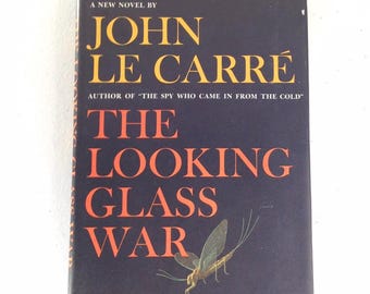 John Le Carre “The Looking Glass War” hardcover with dust jacket in good vintage condition. Any wear is pictured.