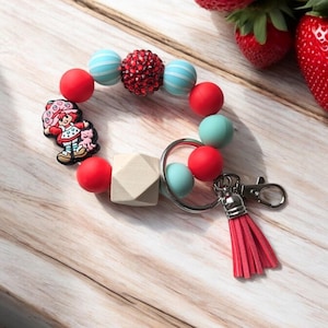 Pulsera con dije de niña fresa rosa con cuentas de silicona, llavero extensible de 7,5"