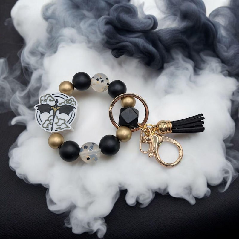 Dragon War College Wristlet Keychain 7.5" Silicone Stretchy Key Ring Tasseled