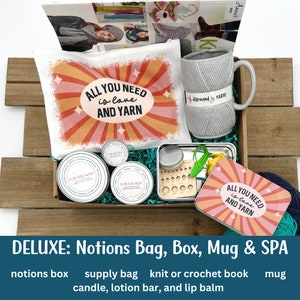crochet gift box that includes a crochet book, knitting supply bag, crochet notions tin, and spa items