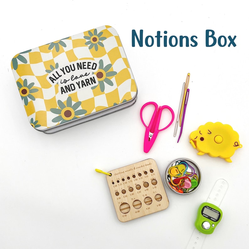 a crochet and knitting notions box are shown with the items included inside the box.