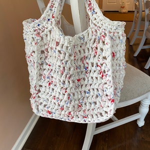 Upcycled plastic bags.  Turned into tote bag.   Crochet PATTERN in 2 sizes by Grannie Annie