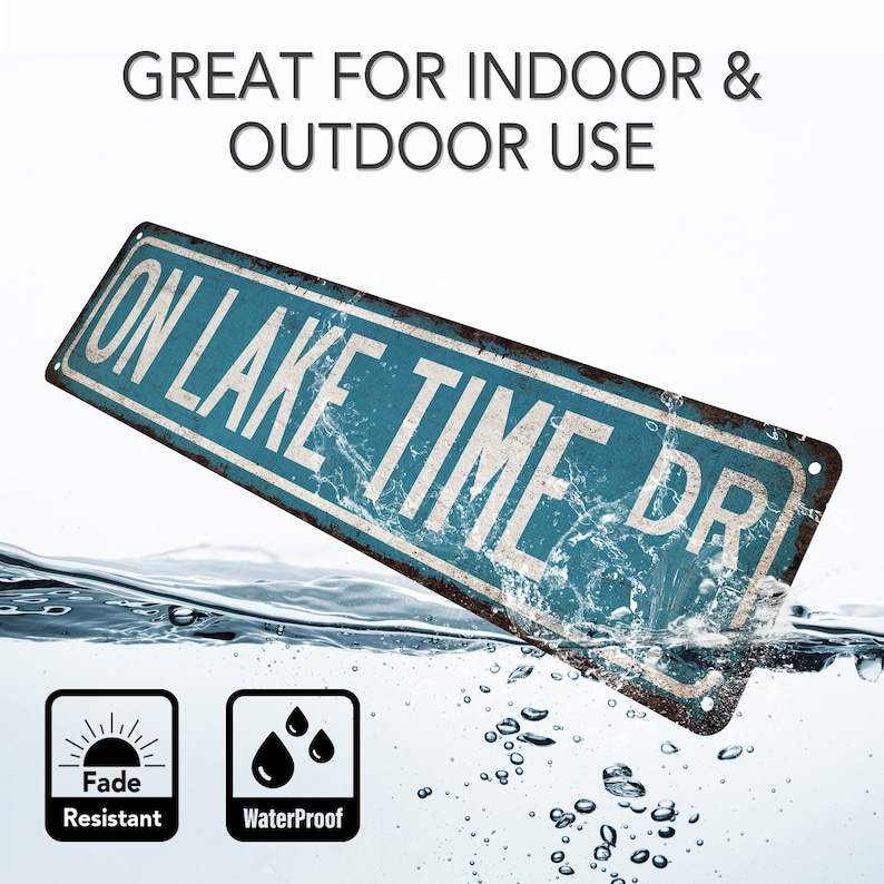 May include: A blue and white metal sign with the text "ON LAKE TIME DR" in white lettering. The sign is partially submerged in water and has a distressed, rusty look. The sign is fade resistant and waterproof.