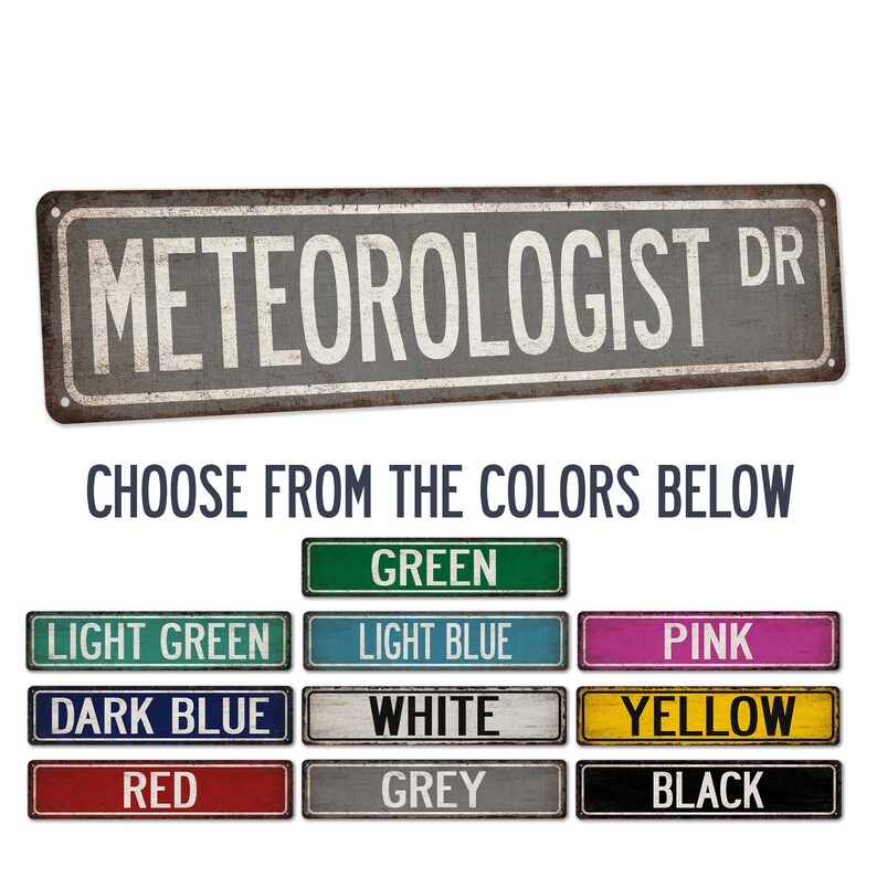 May include: A metal sign with the text "METEOROLOGIST DR" in white letters on a gray background. The sign is distressed and has a rusty appearance. Below the sign are ten color swatches labeled with the color names: green, light green, light blue, pink, dark blue, white, yellow, red, grey, and black.
