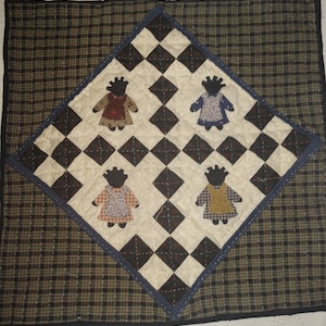 Hand applique Baby girls in braids small quilted wall hanging