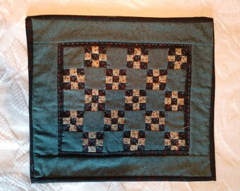 Black and teal checkerboard small quilt