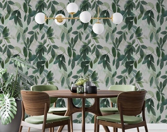 May include: A dining room with a wooden table and four green chairs. The wall is covered in a green and white leafy wallpaper. A gold chandelier with five white globe lights hangs above the table.