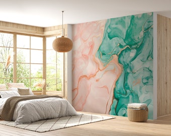 May include: A bedroom interior with a large wall mural featuring abstract pink and green marbleized patterns with gold accents. The mural is behind a bed with a white duvet and a brown knitted throw blanket.