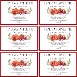 May include: Rectangular cards with a red border feature the text "HOLIDAY APPLE PIE" and instructions for a simmering pot recipe. The cards include illustrations of apples, cinnamon sticks, and pomegranates.