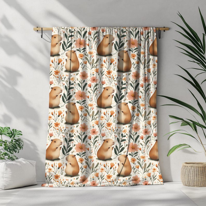 May include: A white curtain with a repeating pattern of brown guinea pigs and orange flowers. The guinea pigs are depicted in a cartoon style and are holding flowers.