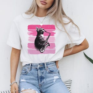 Kat speelt saxofoon tshirt grappige kat jazzmuziek shirt vintage saxofonist retro kat saxofonist Valentijnscadeau voor haar kat muzikant tshirt