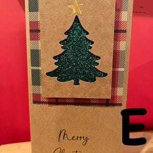 Colección de monederos navideños con saludos impresos