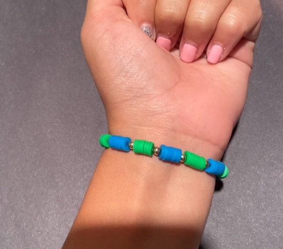 Bracelet with Green and Blue Clay Beads and Gold Balls.