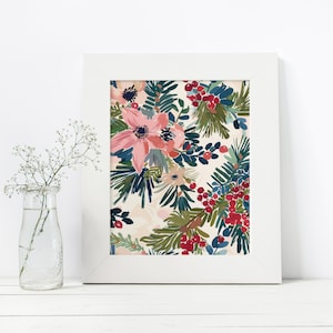 May include: A white framed print featuring a floral pattern with pink, red, and blue flowers and berries on a cream background.