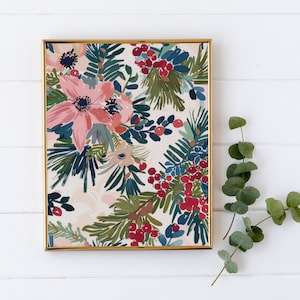 May include: A framed print with a floral pattern featuring pink flowers, green leaves, and red berries on a white background.